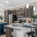 kitchen with a bar and stainless steel appliances 