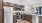 kitchen with a bar and stainless steel appliances 