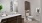 Model bathroom at Rosalia Verdae 55 and over apartments in Greenville, SC, featuring wood grain floor paneling.