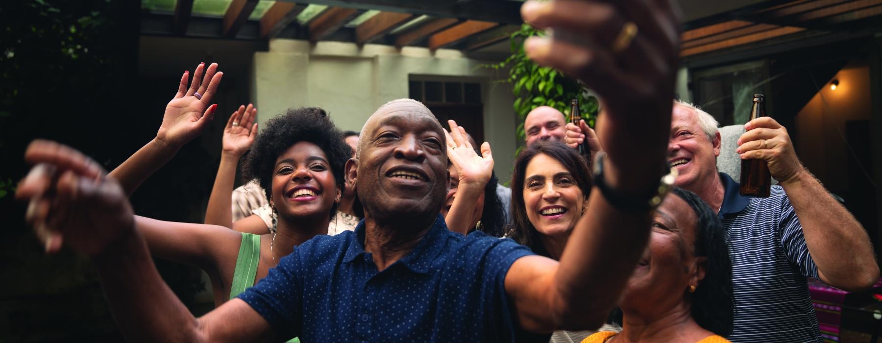 a group of people raising their hands